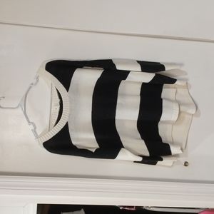 Black & White Sweater with Button's down the back.